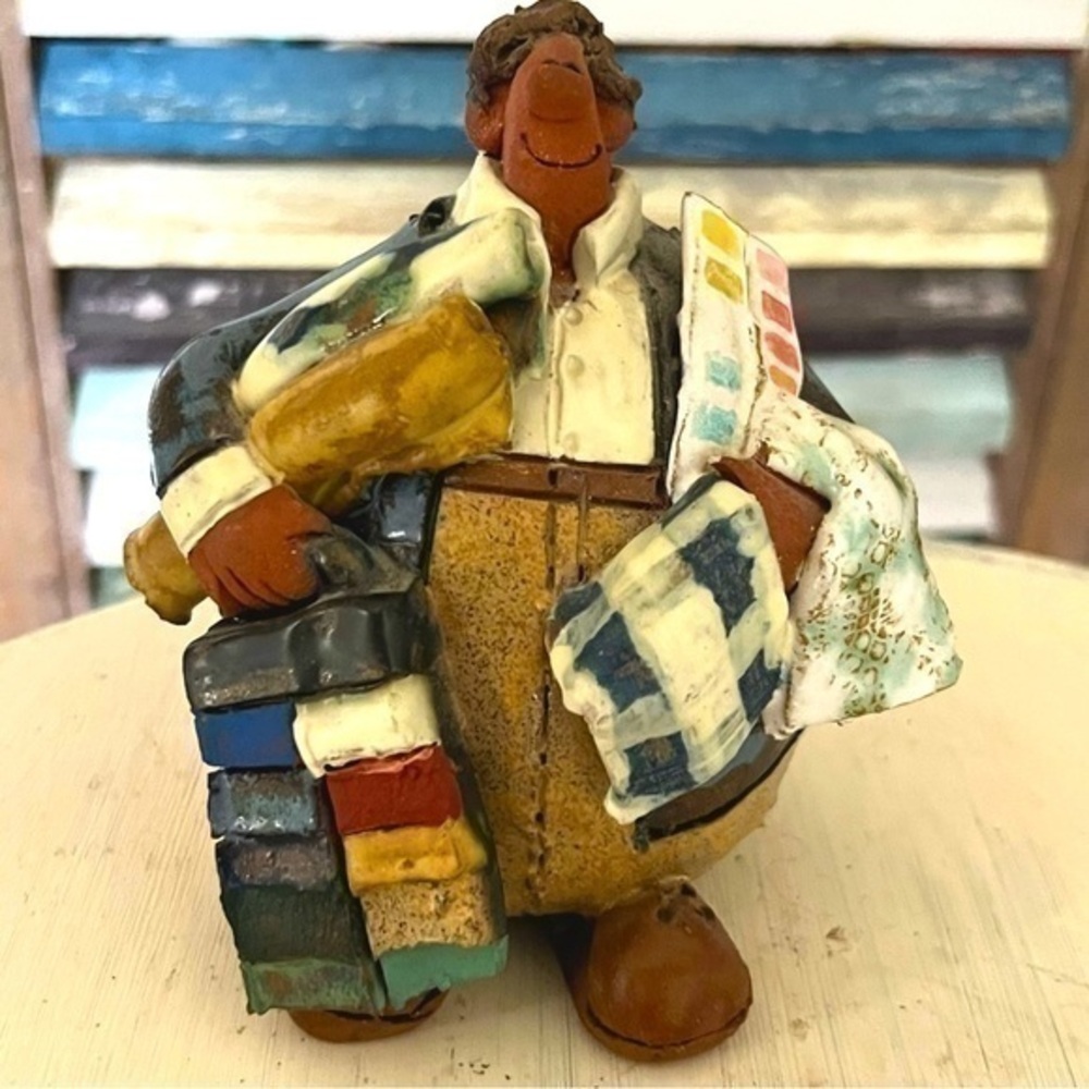 Sara Meadows pottery art balloon people, interior decorator, 5” high. Like new.